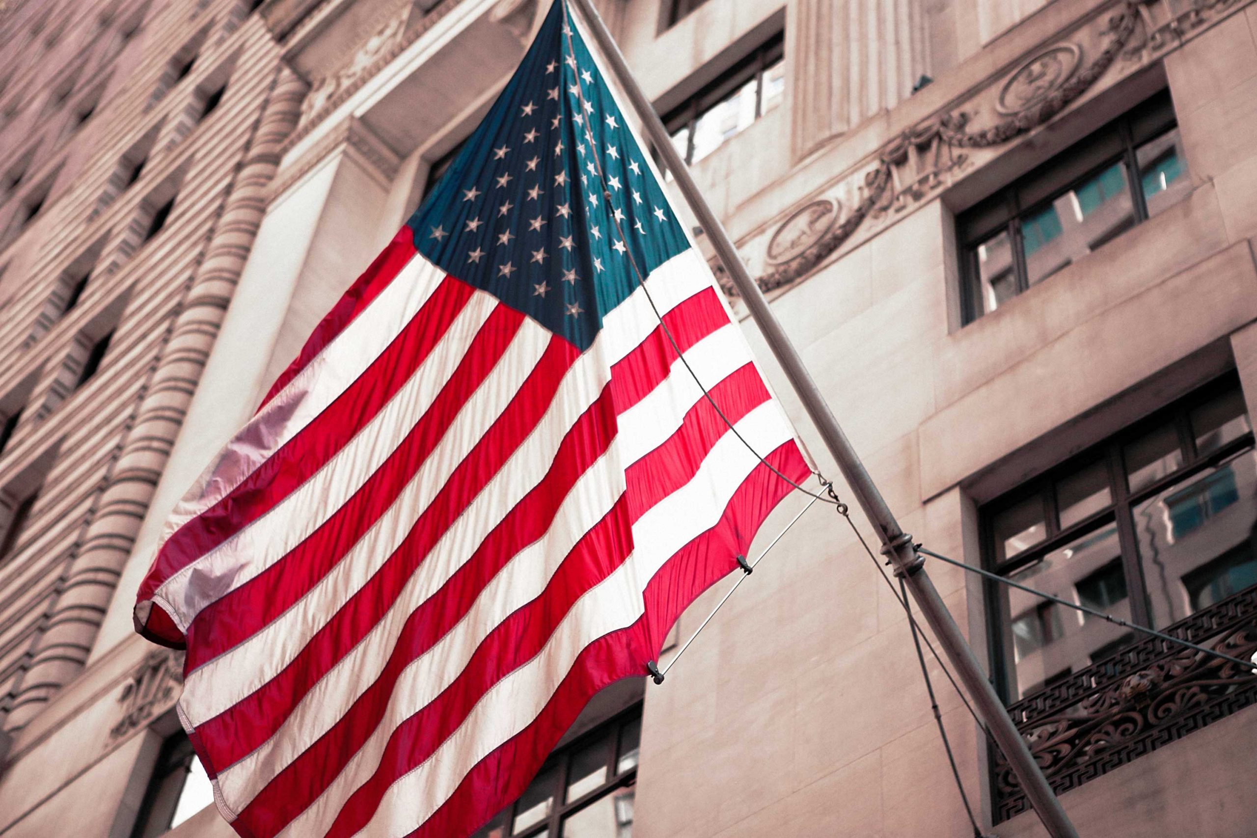 American flag hanging on building