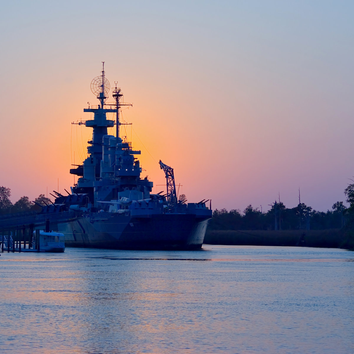 Sunset behind USS North Carolina