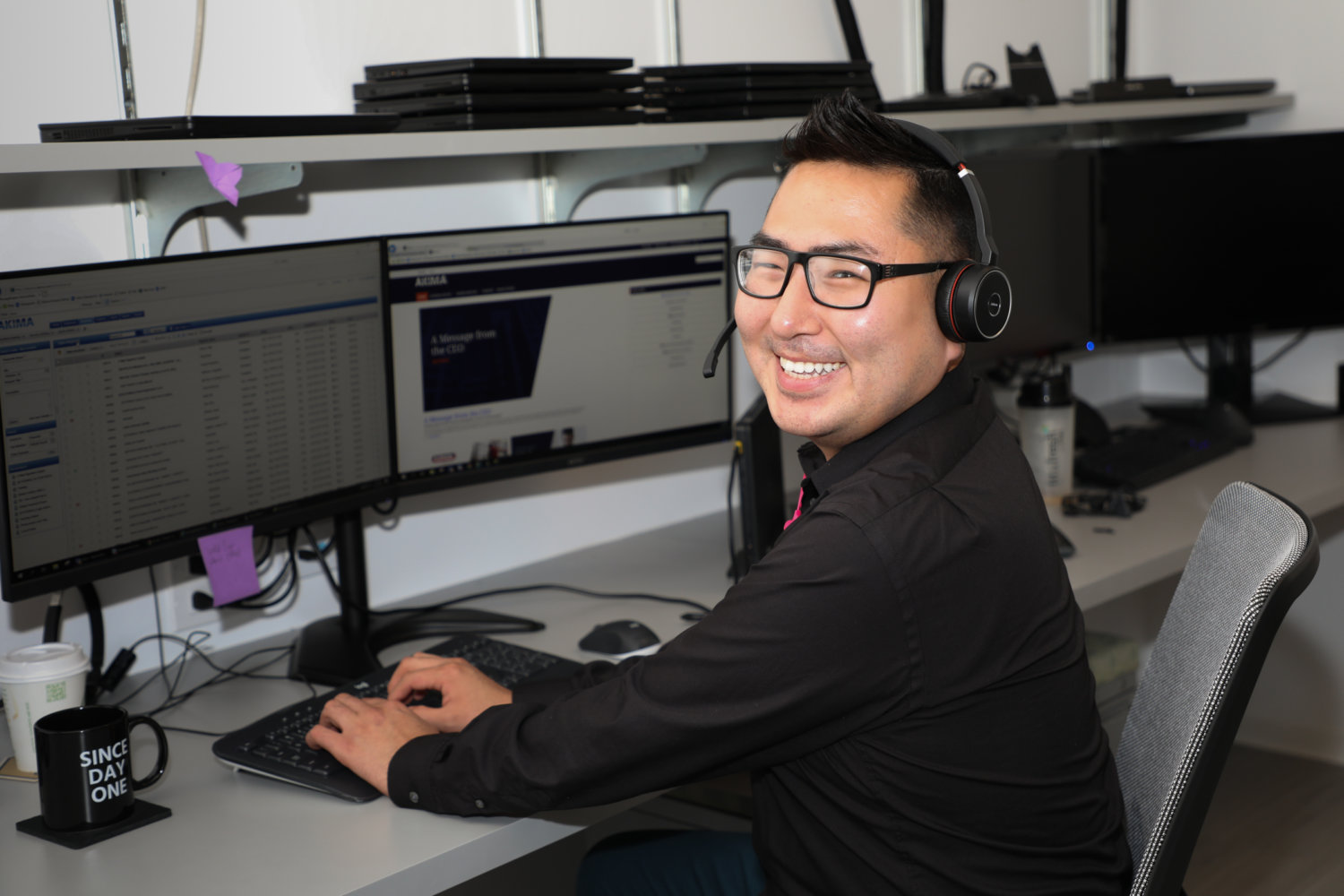 Akima intern working at a computer