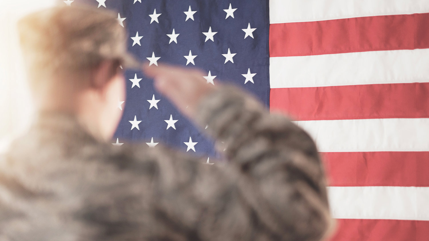 Man saluting the American flag