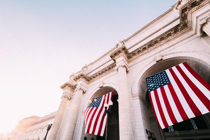 American flags hanging on government building