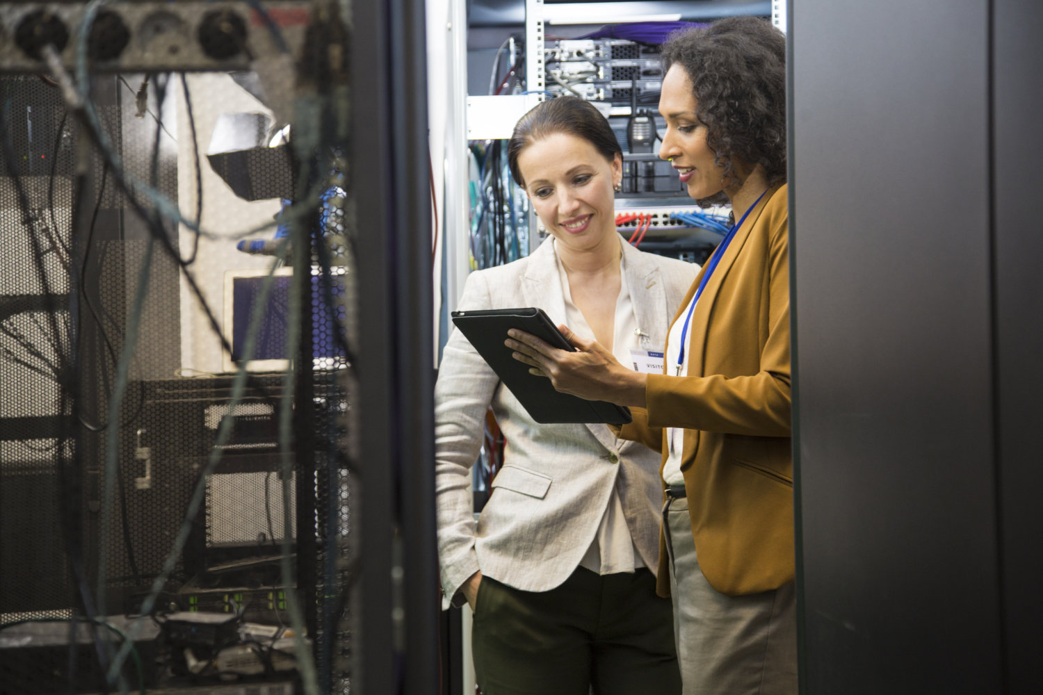 IT professionals having meeting in server room